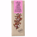 Corteza de chocolate con leche, perlas de nieve, grosellas, avellanas y fresas